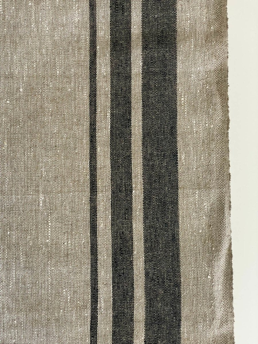 Natural narrow linen fabric with black side stripes - earthytextiles